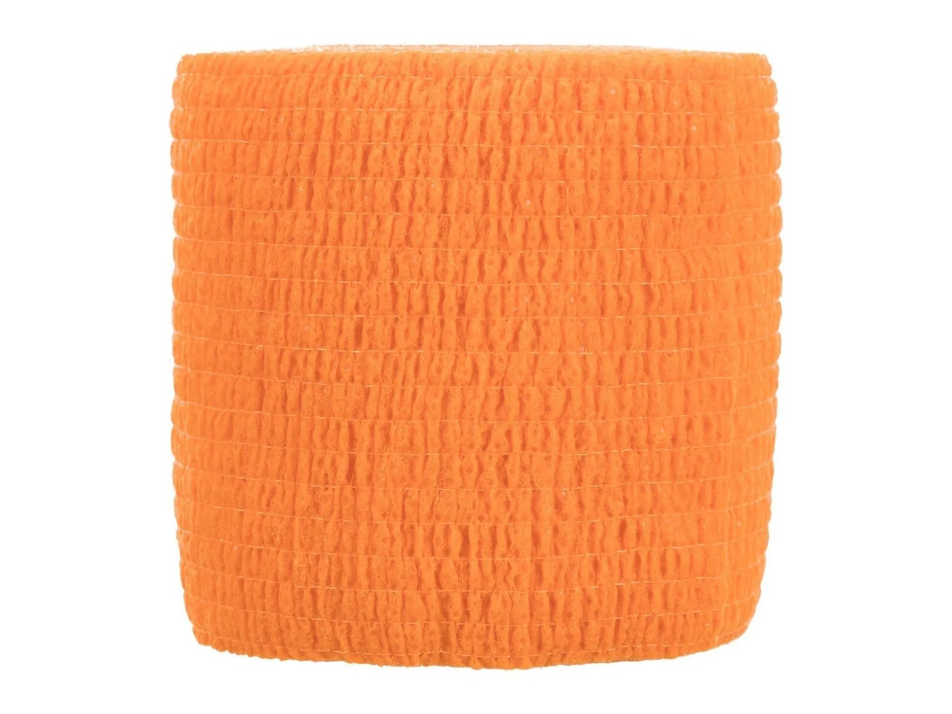 Rull med oransje, fleksibel og selvklebende bandasje for sårbehandling til hund og katt.