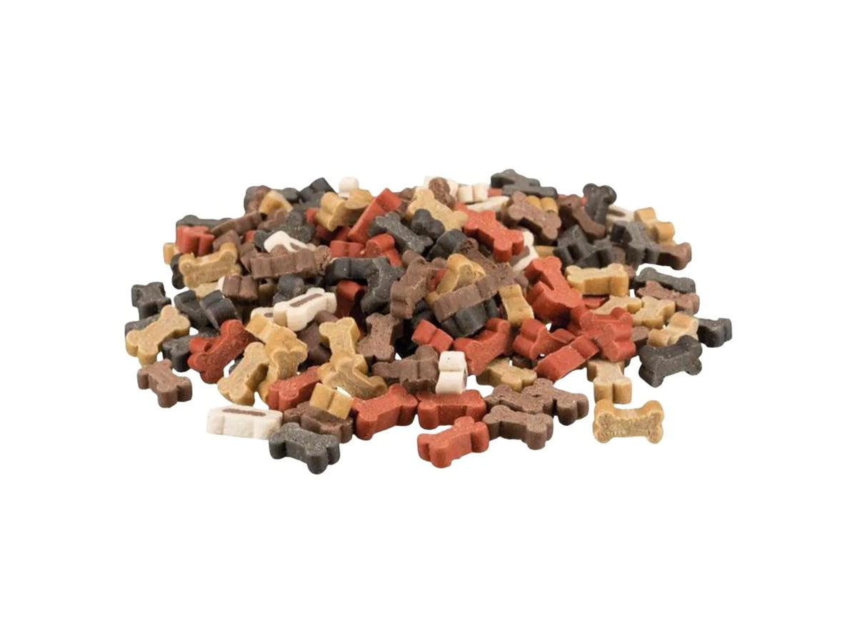 Haug med små, beinformede hundesnacks i brun, rødbrun, beige og mørkegrå farger.