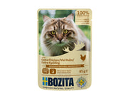 Bozita Chicken Chunks in Sauce 85gr våtfôr for katt, med bilde av en langhåret katt på beige emballasje.