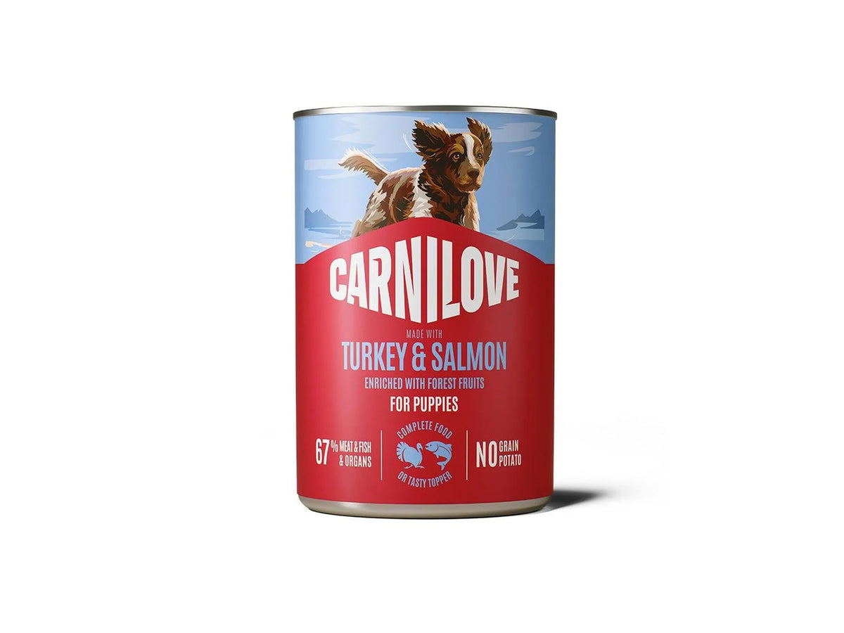Carnilove puppy pate with turkey and salmon in a 400g can, featuring a dog illustration.