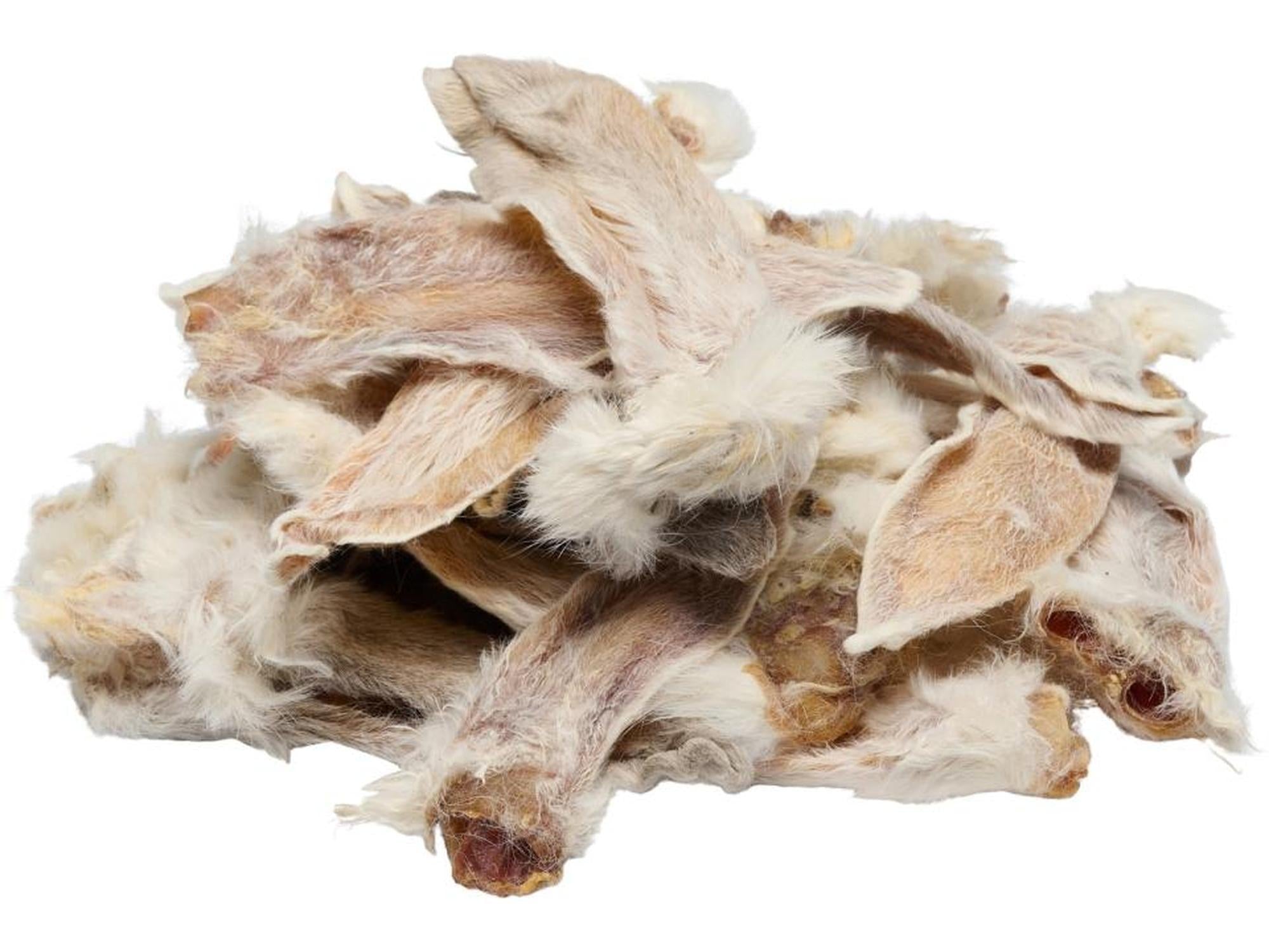 Trixie kaninører med pels, naturlige tørkede tyggeben i lysebrune og hvite nyanser.