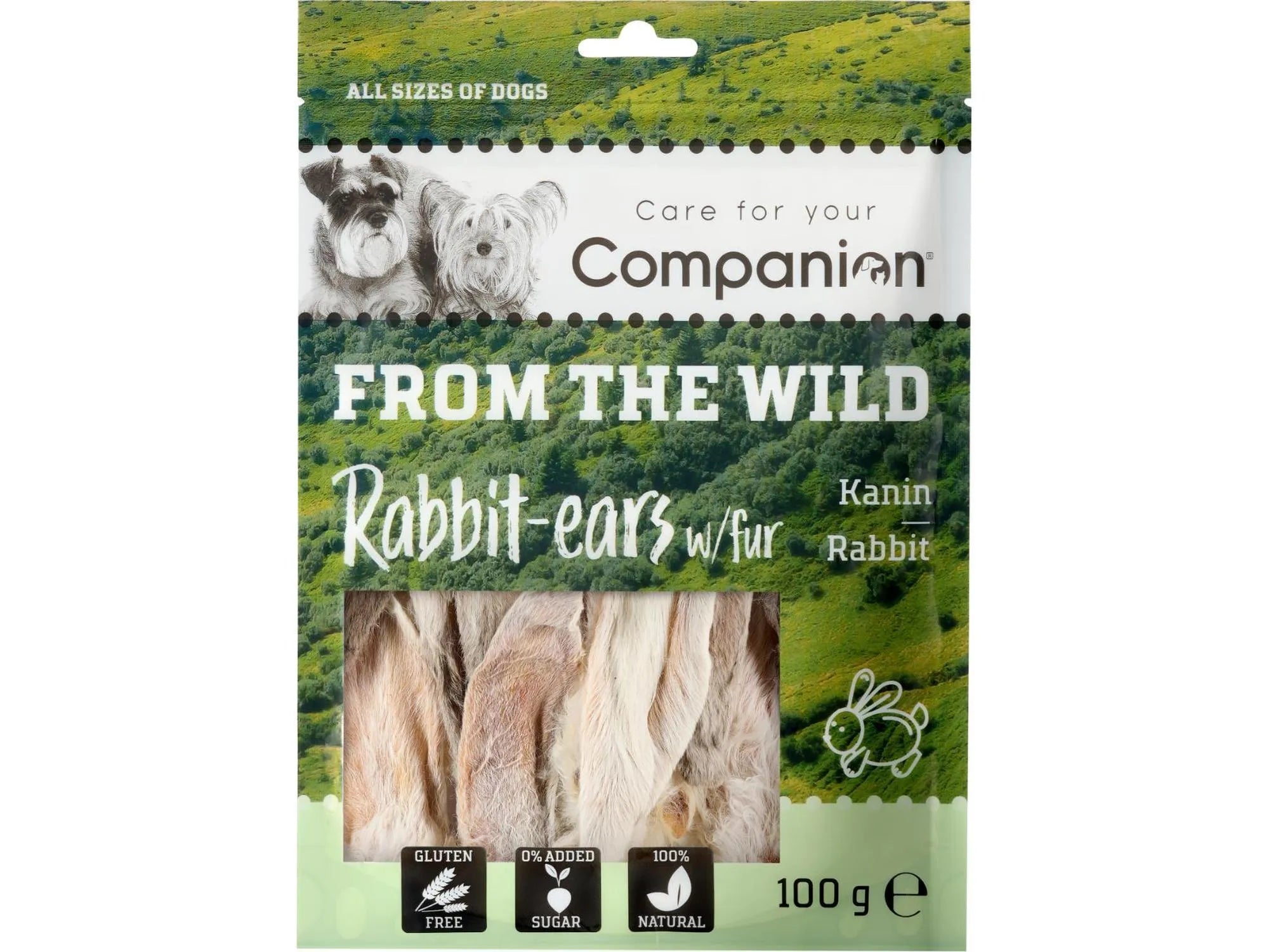 Companion From the Wild kaninører med pels, 100g, i en grønn og hvit pose med hundebilder.