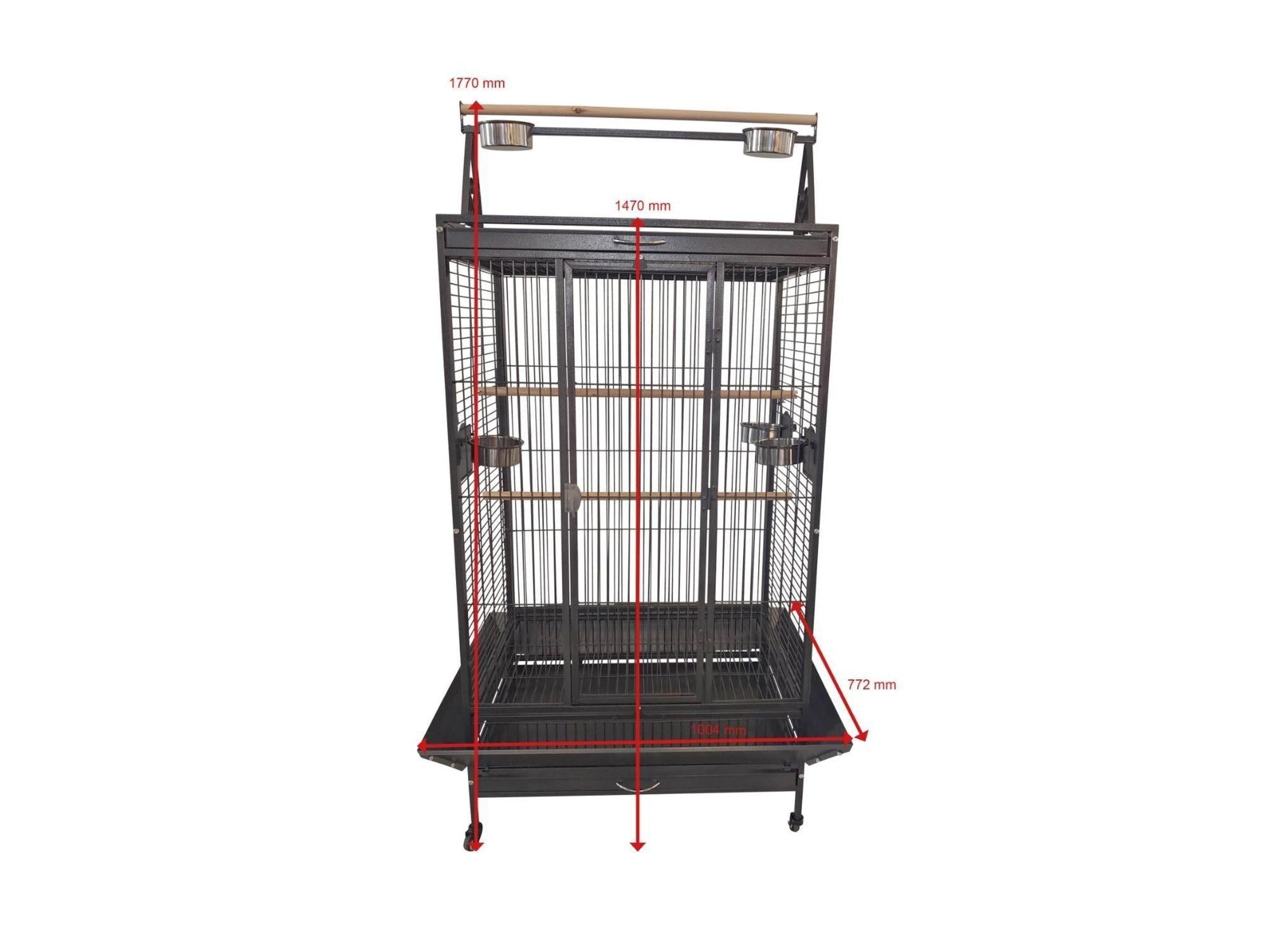 Svart Companion Play Pen papegøyebur i metall med lekeområde på toppen, sittepinner og matkopper.