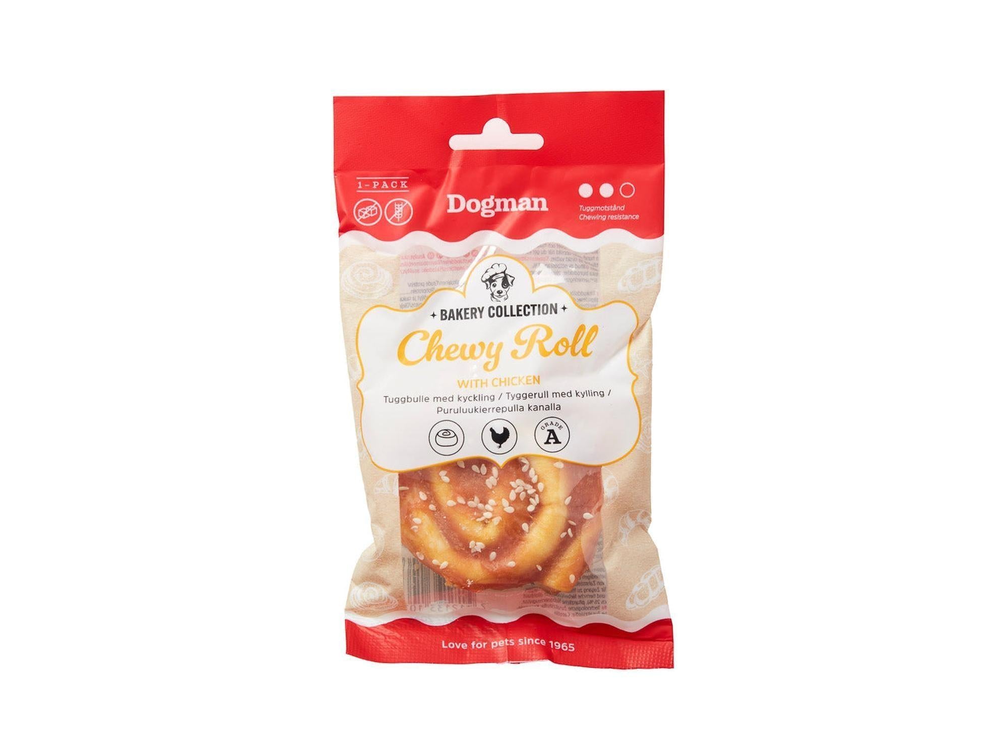 Dogman Bakery Collection Chewy Roll Duck, en kanelbolleformet tyggerull med andekjøtt og sesamfrø, i rød og beige emballasje.