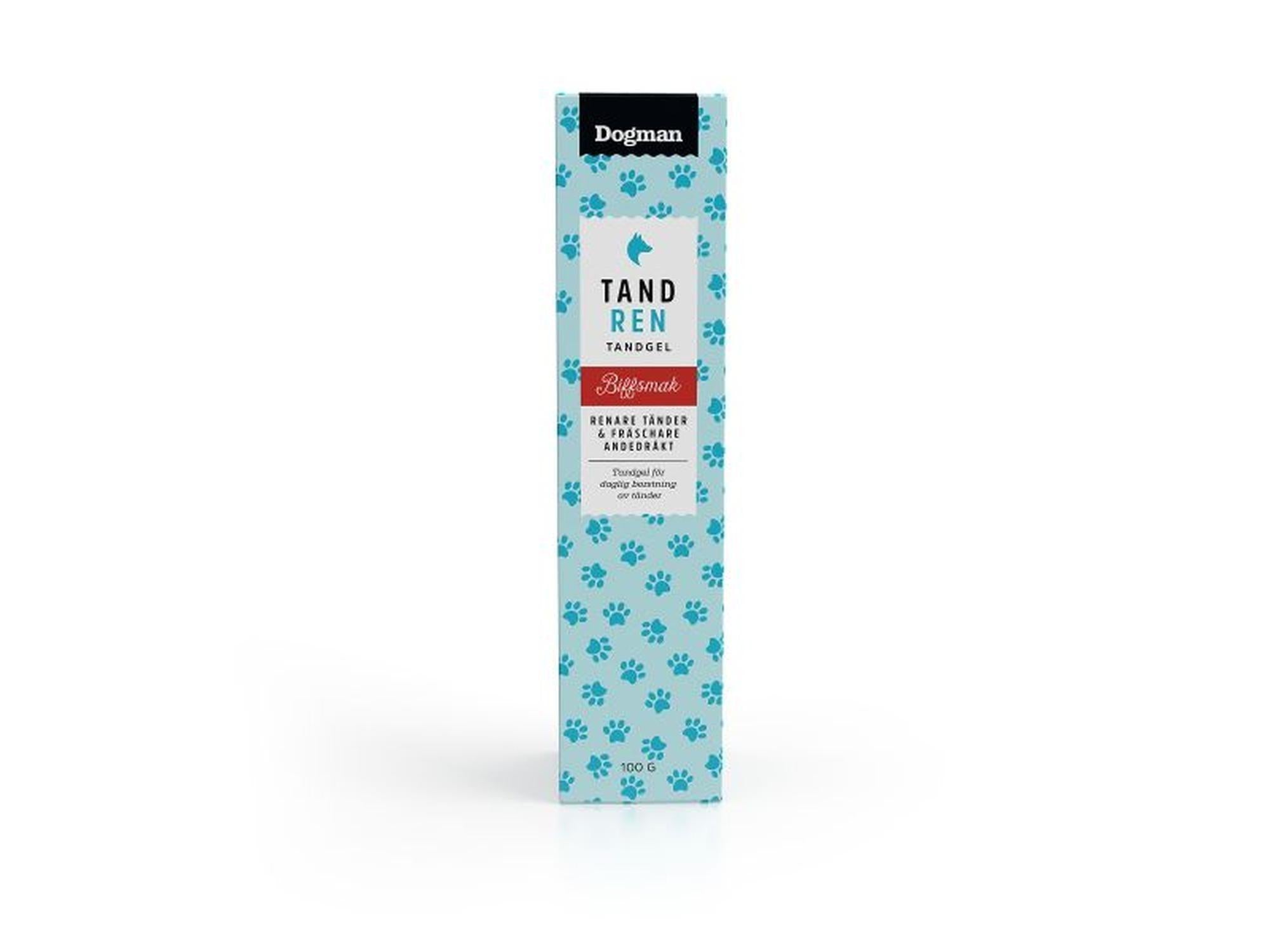 Dogman Tandgel 100g for hunder, hvit tube med blå potetrykk og rød "Biffsmak" etikett.
