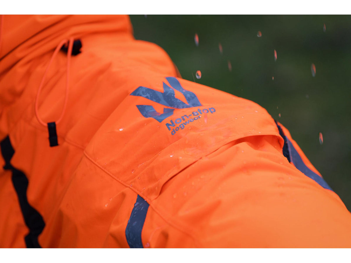 Non-stop dogwear Fjord overall raincoat regndress – Oransje/svart