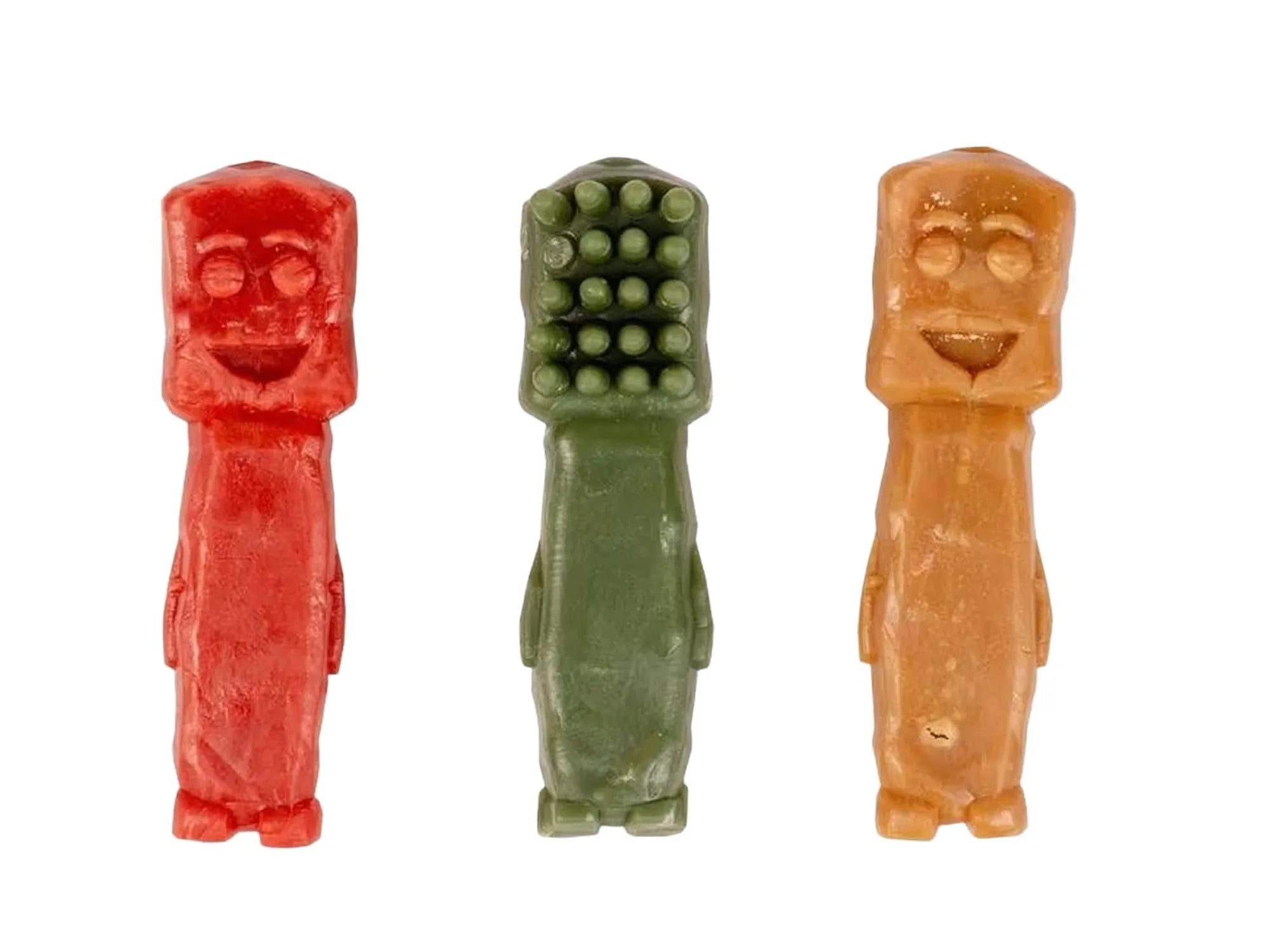 Tre Garden Bites Toby Toothbrush hundegodbiter i rød, grønn og oransje, med tannbørsteformet hode.