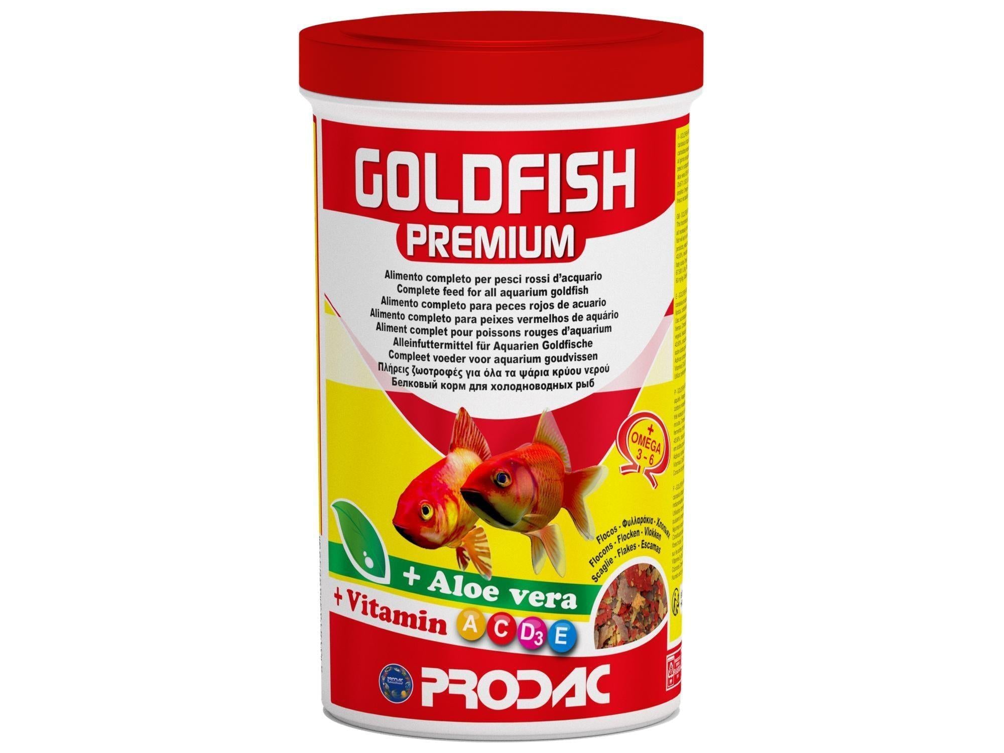 Goldfish Premium flakes 20gr fish food container with red lid, featuring two goldfish and "Aloe vera" and "Vitamin ACDE" labels.