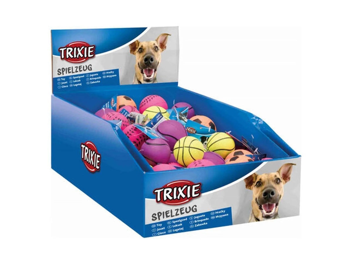 Trixie display med fargerike gummiballer i neonrosa, lilla, gul og oransje, noen med mønster.