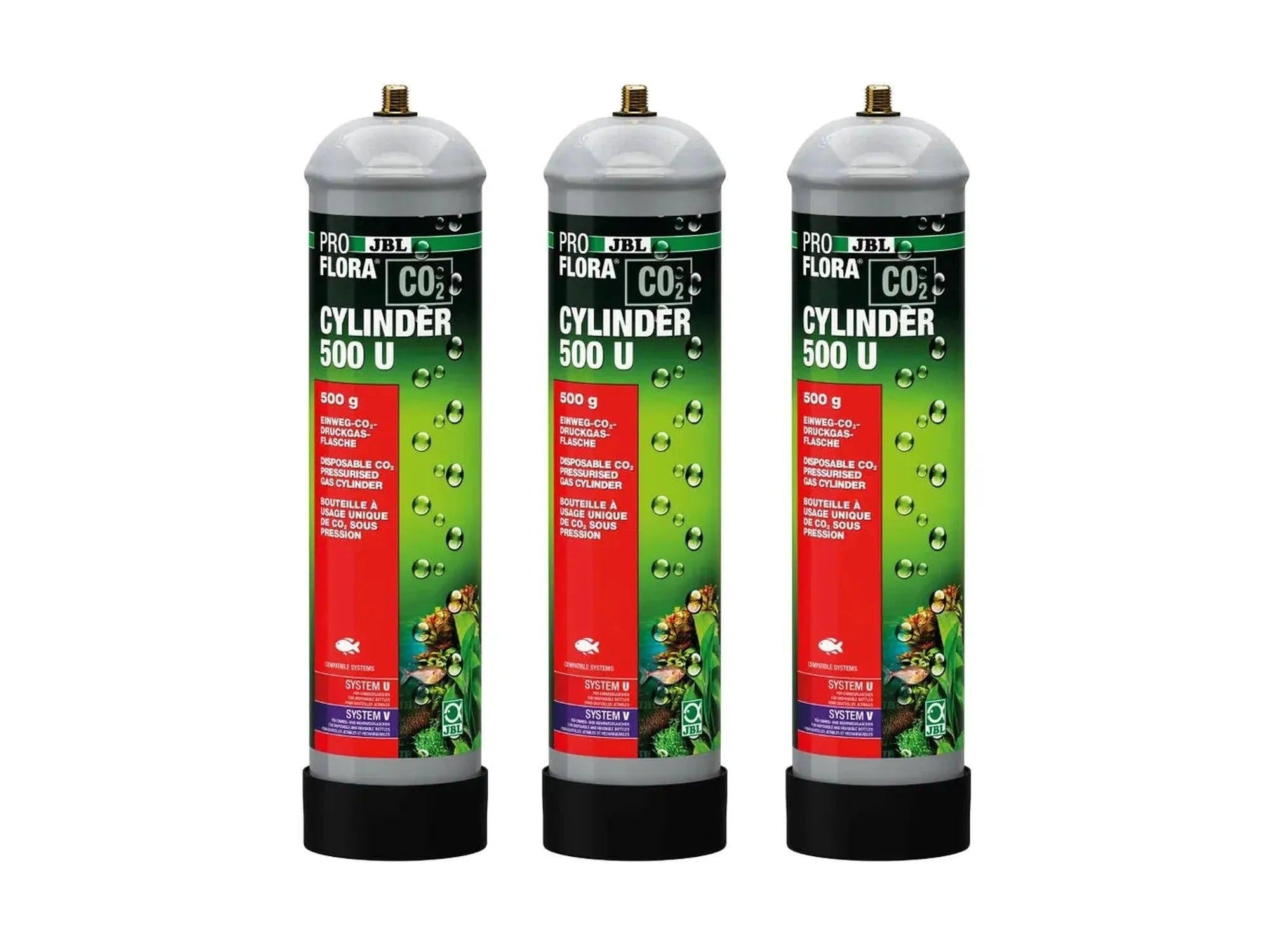 Tre JBL ProFlora 500g CO2-engangssylindere i stål med grønn etikett, svart gummifot og M10x1-gjenger.