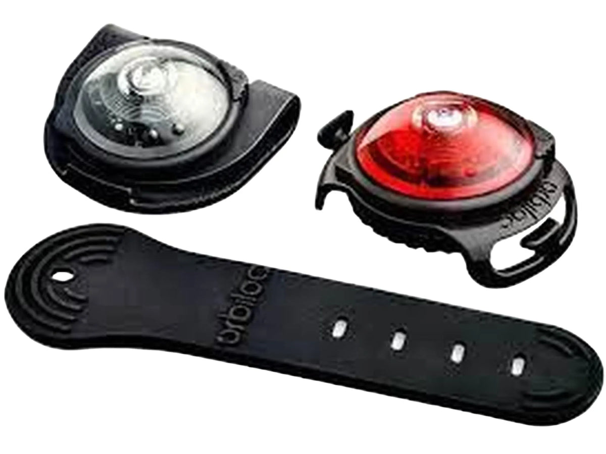 Orbiloc Twin Pack med et hvitt og et rødt LED sikkerhetslys, pluss en svart gummistropp.