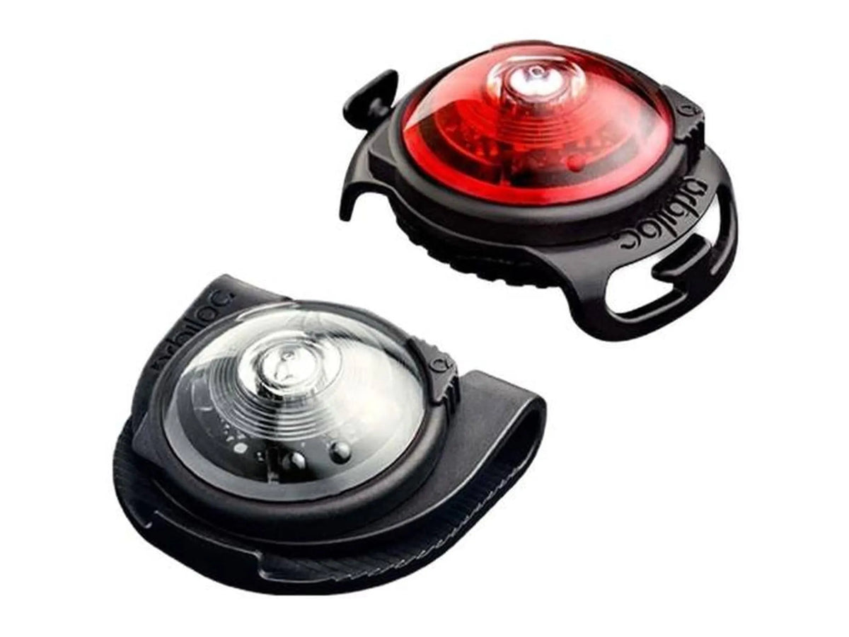 Orbiloc Twin Pack med to svarte, robuste LED sikkerhetslys for hund: ett rødt og ett hvitt.