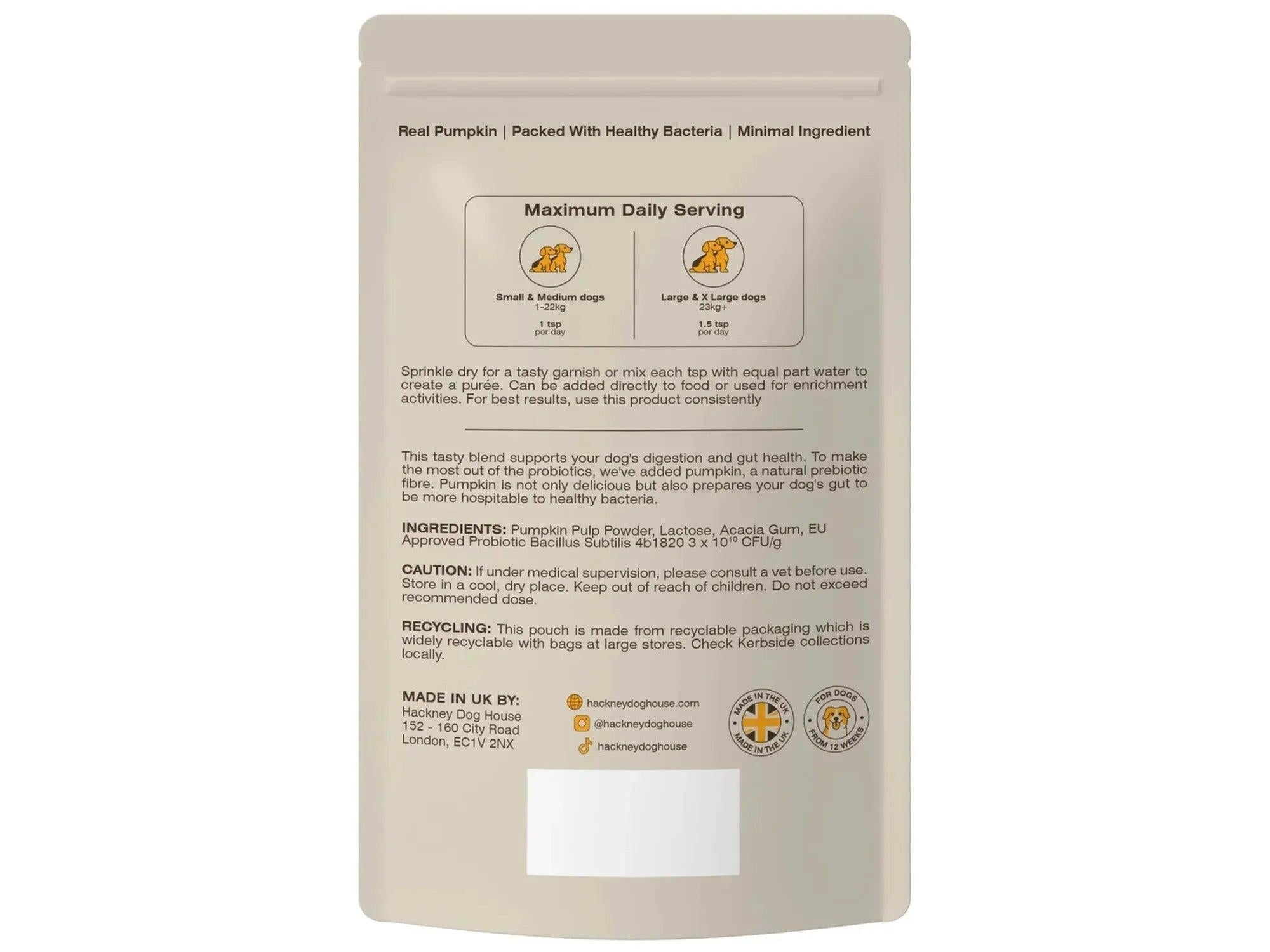Beige pose med "Pumpkin & Probiotics" for hund, detaljer om servering og ingredienser.