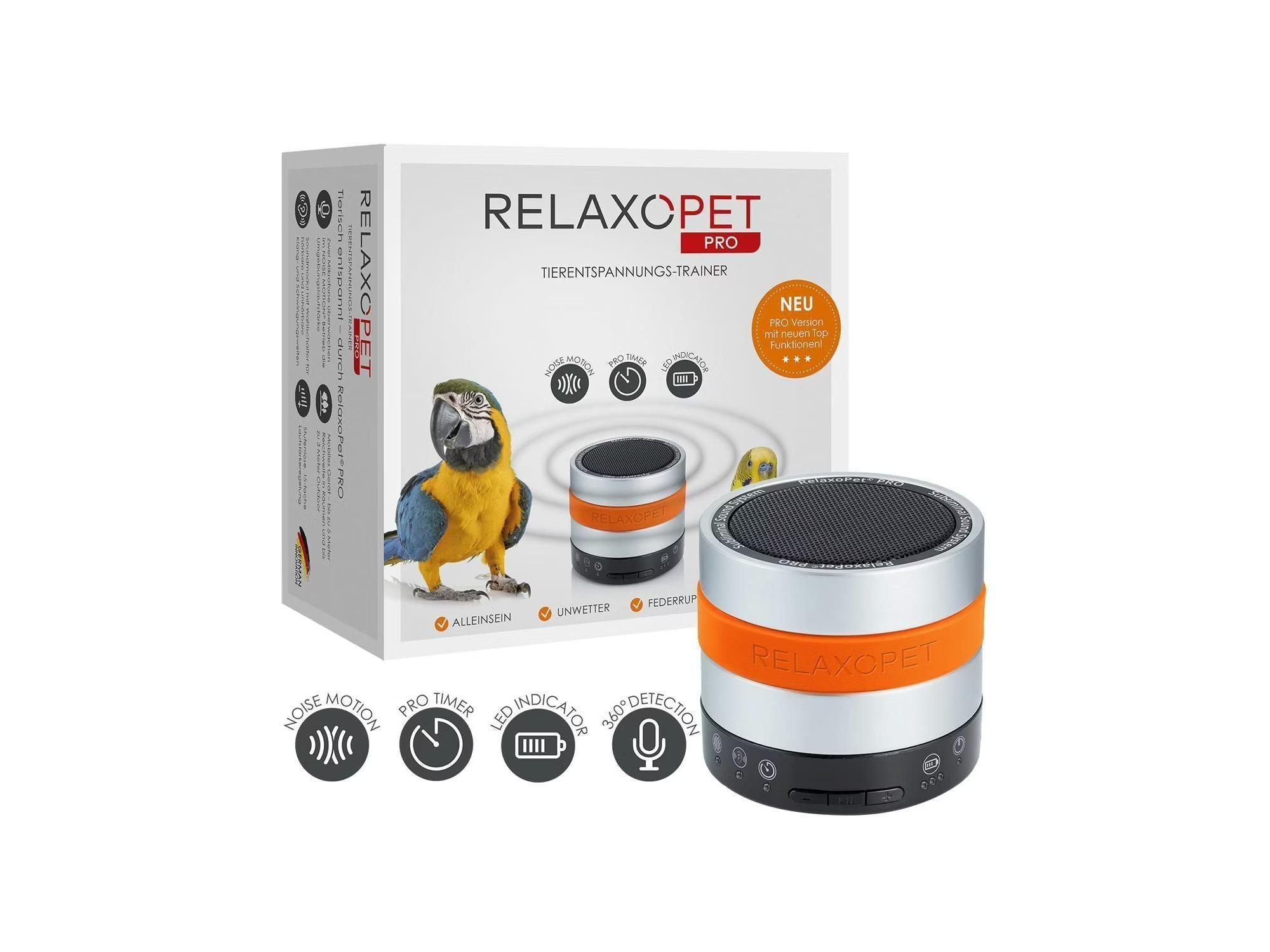 RelaxoPet PRO Bird lydapparat, sylindrisk, sølv og oransje, med høyttalergrill og kontrollknapper.