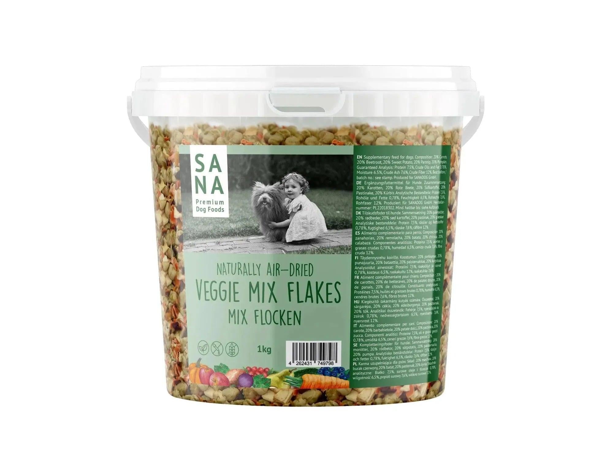 SANA Vegetable-Mix Flakes 1kg bucket with dog and child on label, showing colorful dried vegetables.
