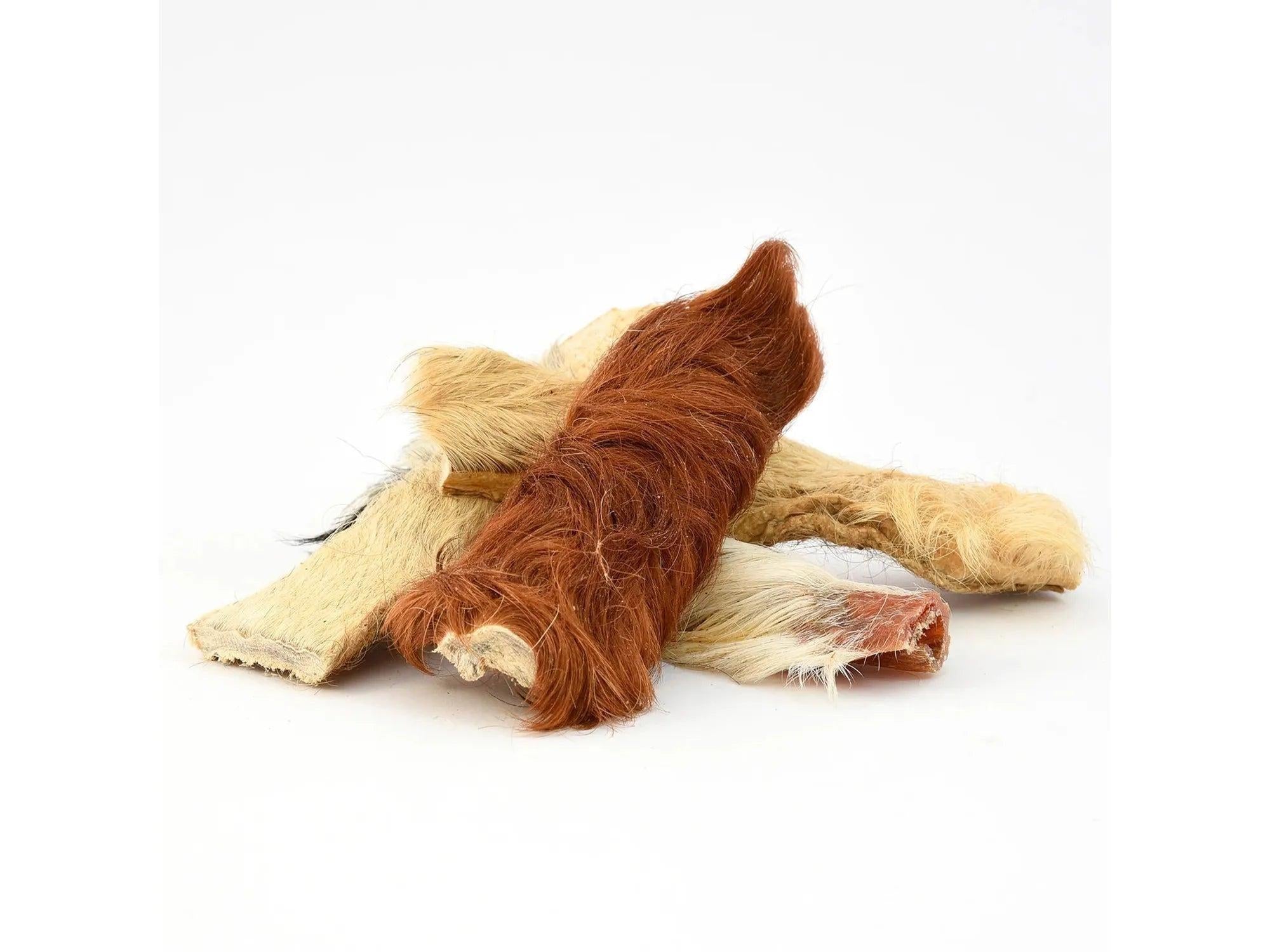 Naturlig råhud okse med pels til hund, i ulike nyanser av brunt og beige.