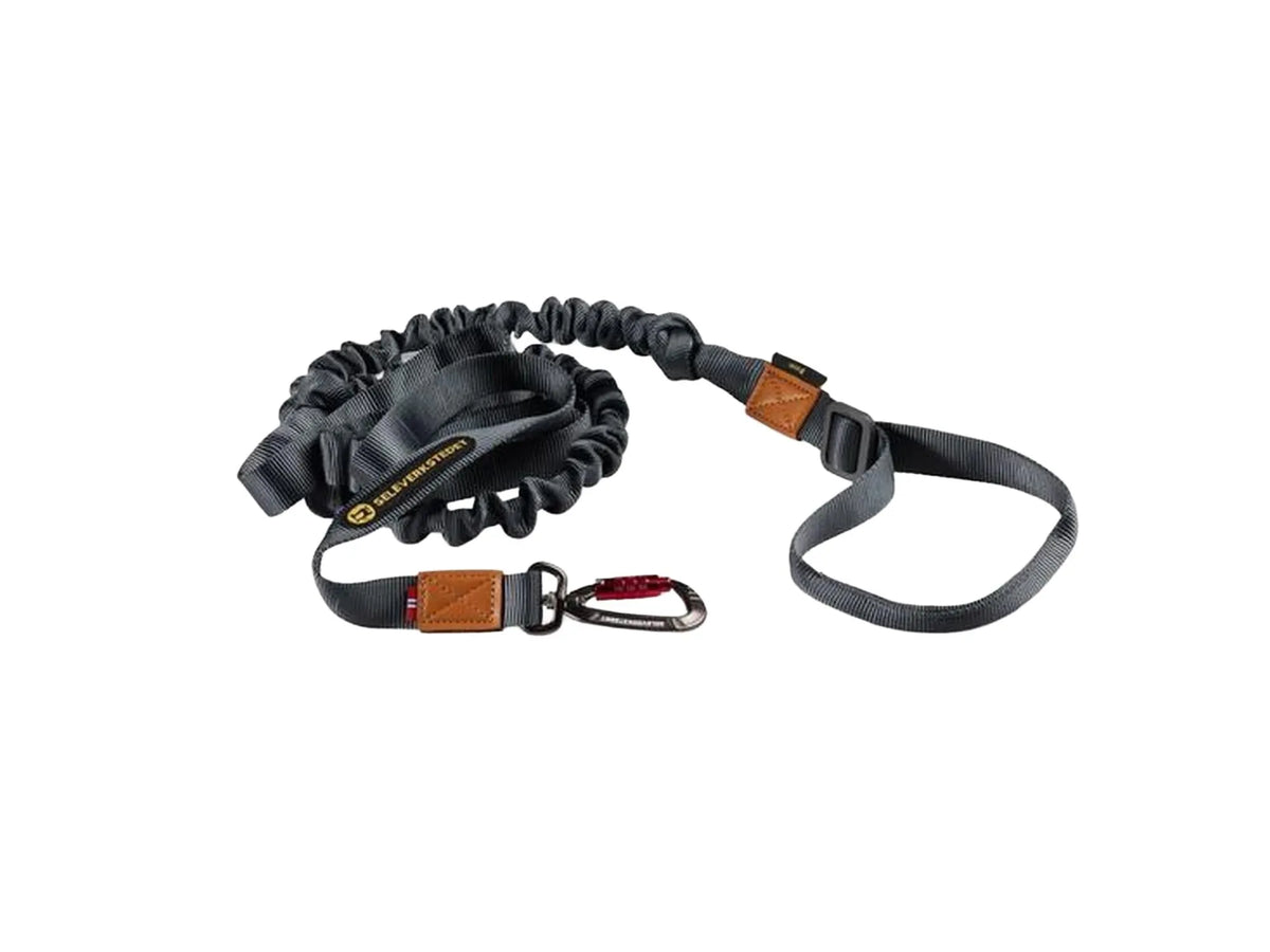 Grå Seleverkstedet Rush Joring Line, elastisk trekkline for hund med karabinkrok og håndtak.