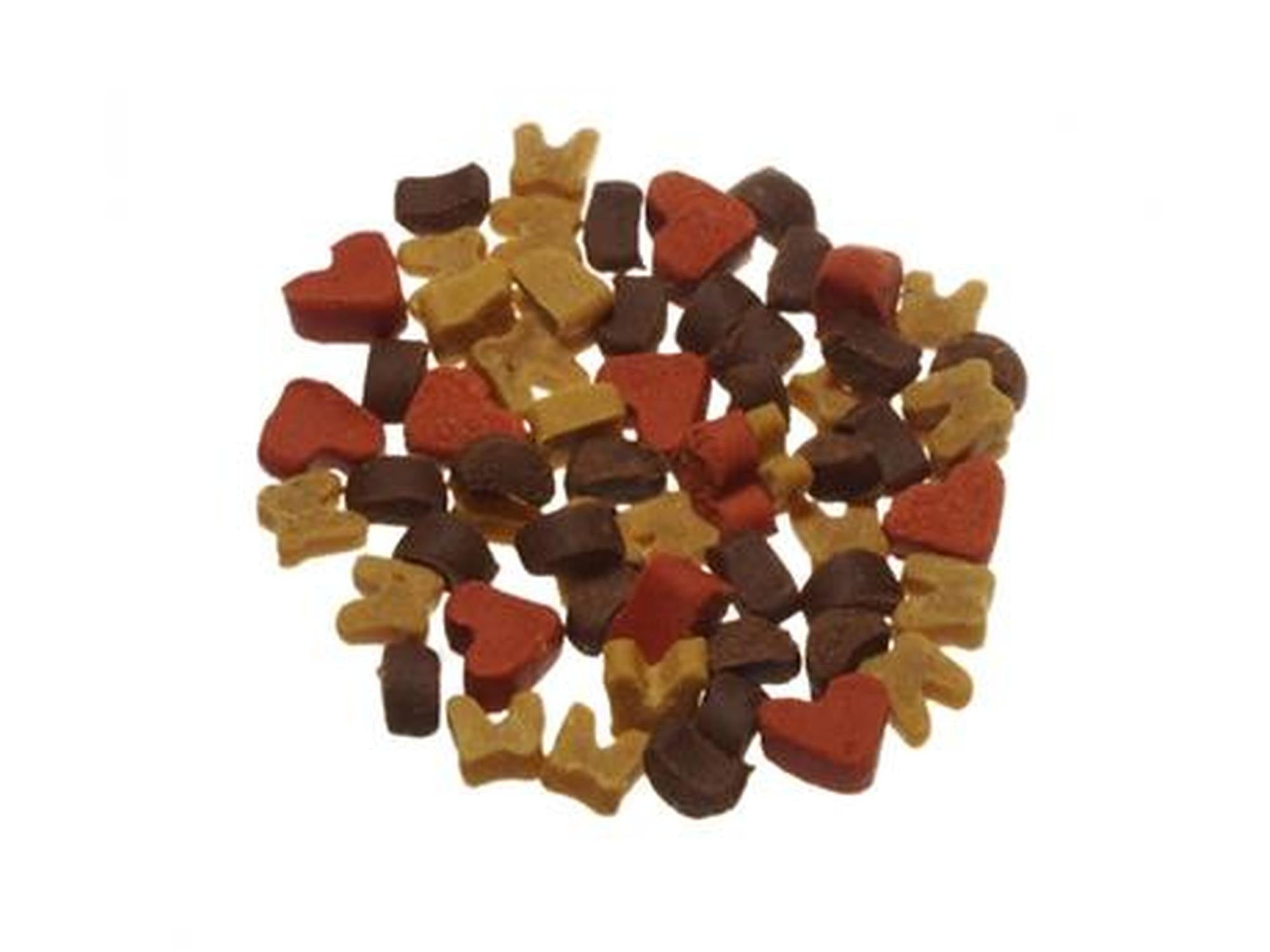 En haug med TreatTime Soft-Snack hundegodbiter i ulike former (hjerter, bein) og farger (rød, brun, beige).