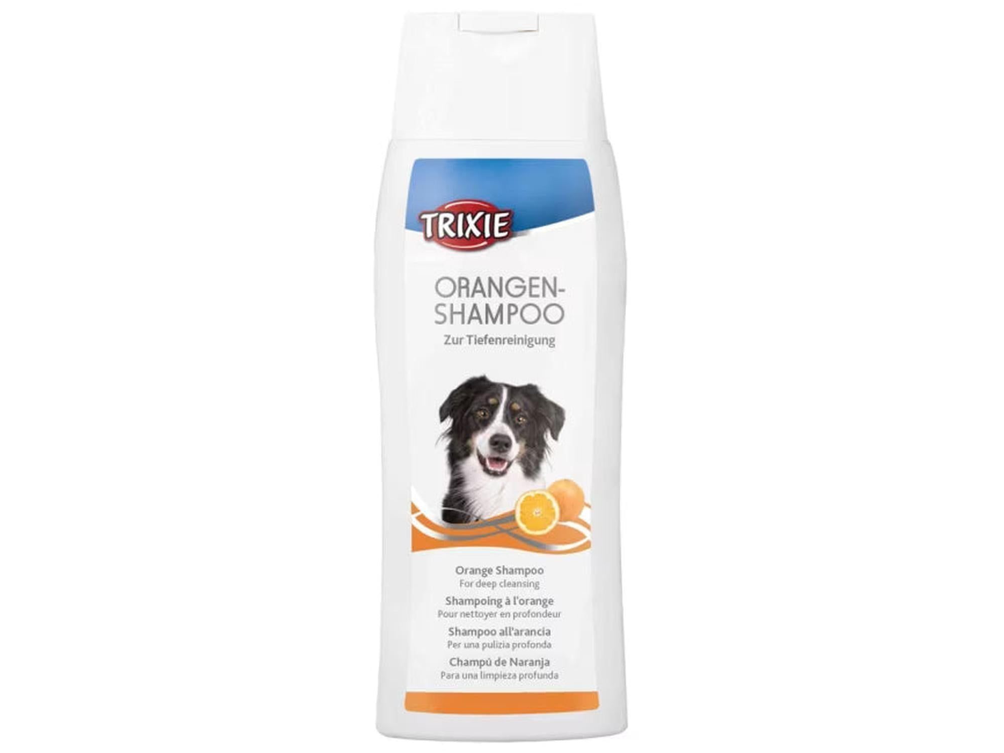 Hvit Trixie Orangen-Shampoo flaske for dyprensende pelspleie, med bilde av hund og appelsiner.