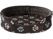 Trixie Jimmy hundeseng i taupe plysj med myk polstring, vendbar pute og dekorative potemotiver.