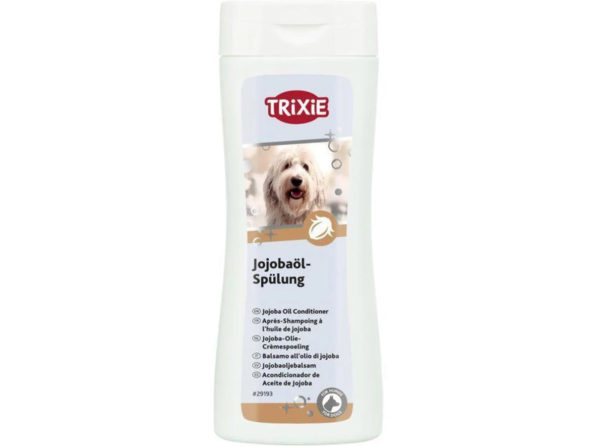 Hvit Trixie Jojoba Oil Conditioner flaske med bilde av en hvit hund.