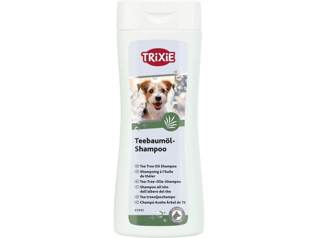 Hvit Trixie Tea Tree Oil Shampoo 250 ml flaske med bilde av en hund og grønne detaljer.