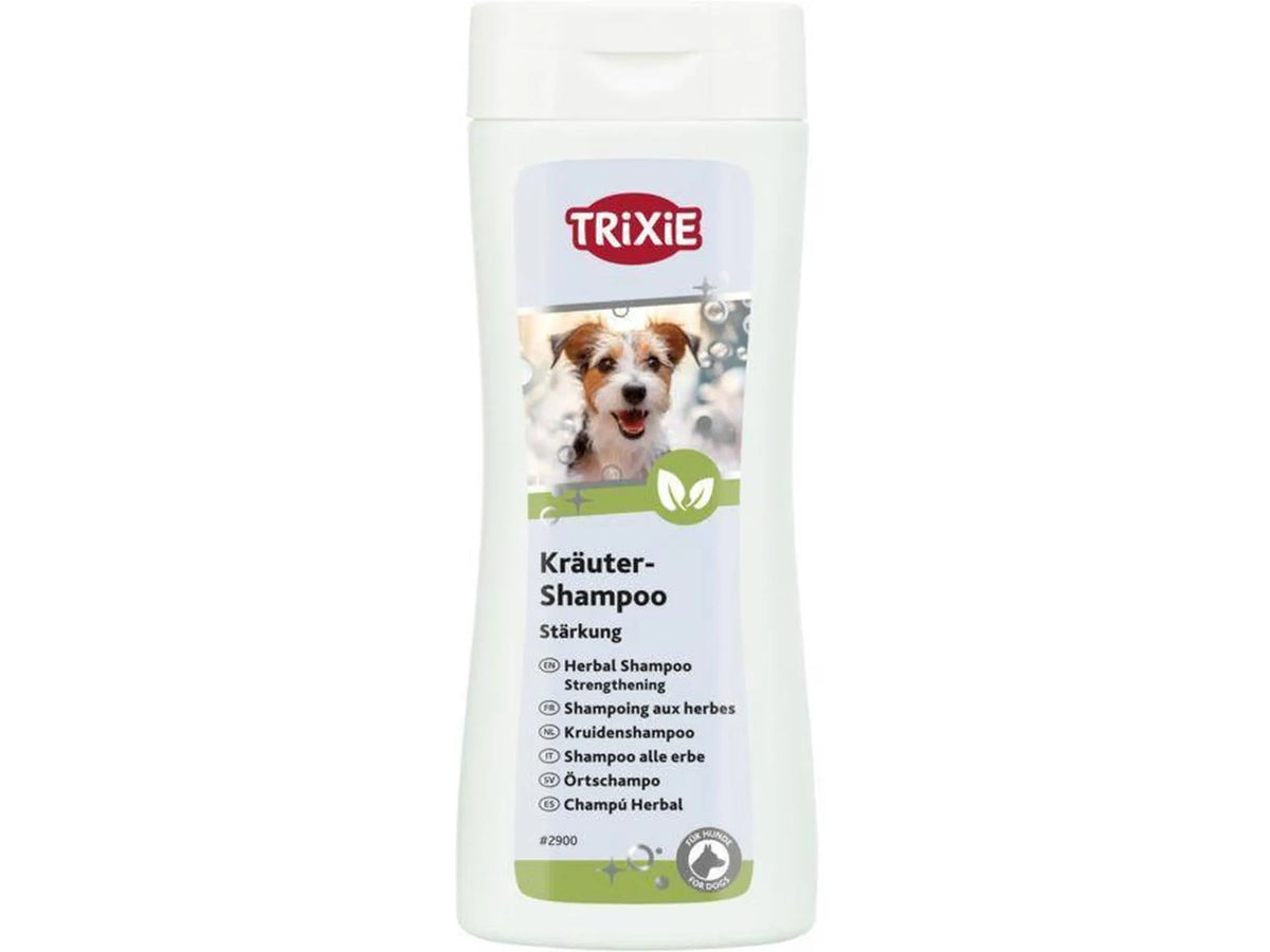 Hvit Trixie Urteshampoo 250 ml flaske med bilde av en hund og grønne urteblader.