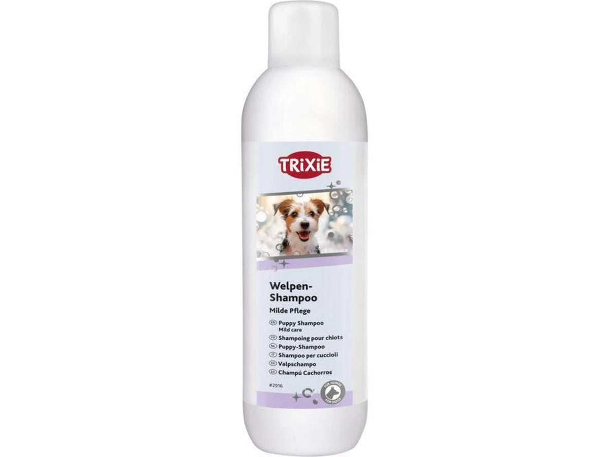 Hvit Trixie Valpeshampoo flaske med bilde av en valp, for mild pelspleie.