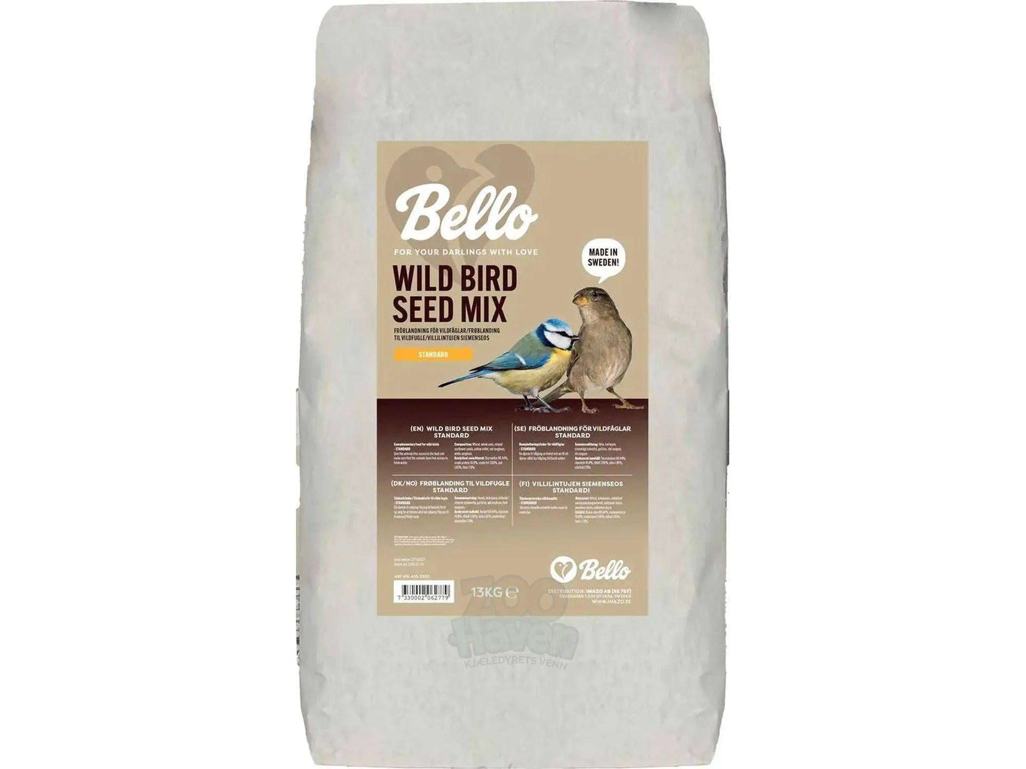 Stor hvit pose med Bello Wild Bird Seed Mix Standard, 13kg, med bilde av en blåmeis og spurv.