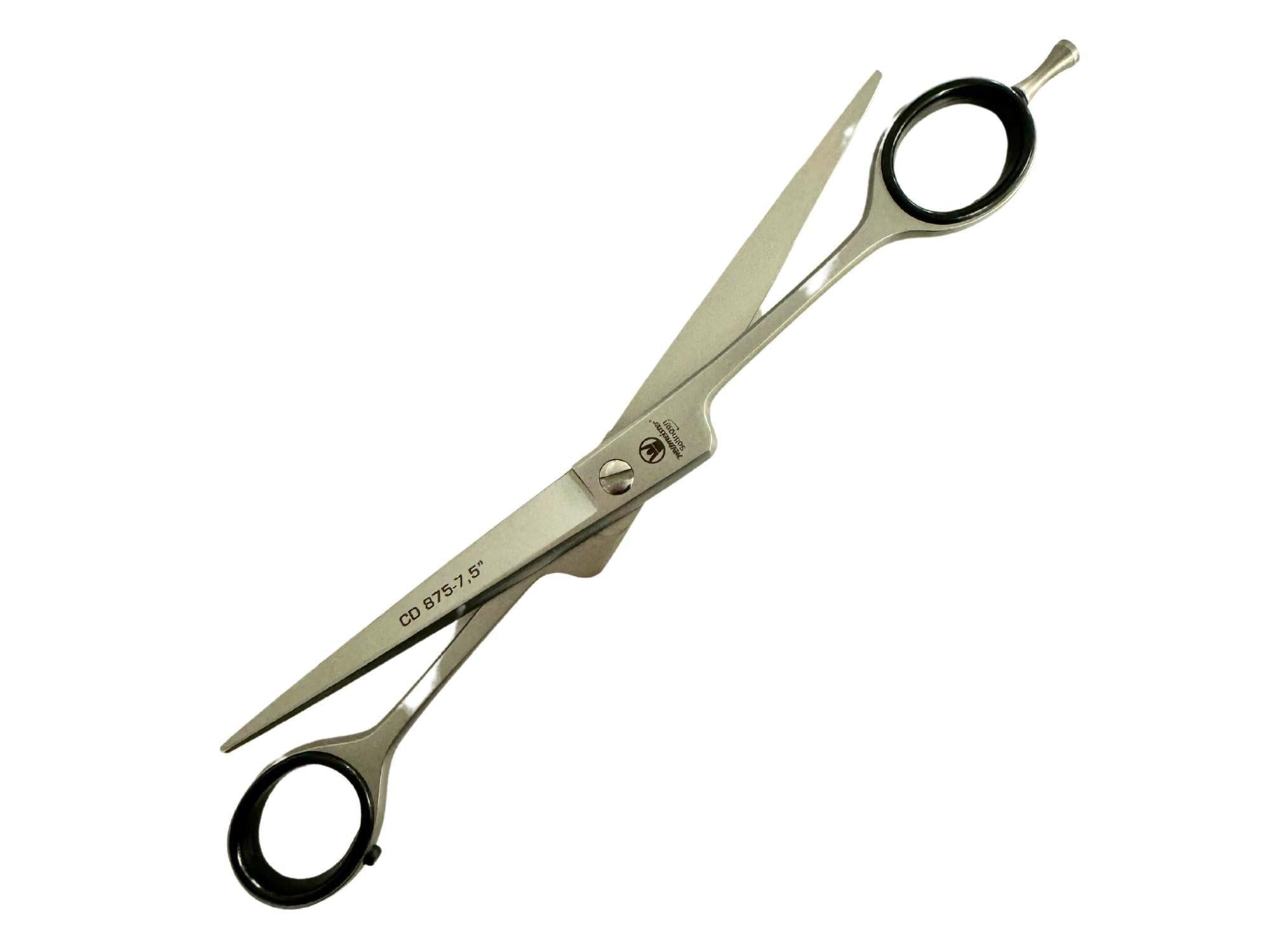 Weltmeister 19cm rett pelssaks i sølvmetall med svarte fingerringer.