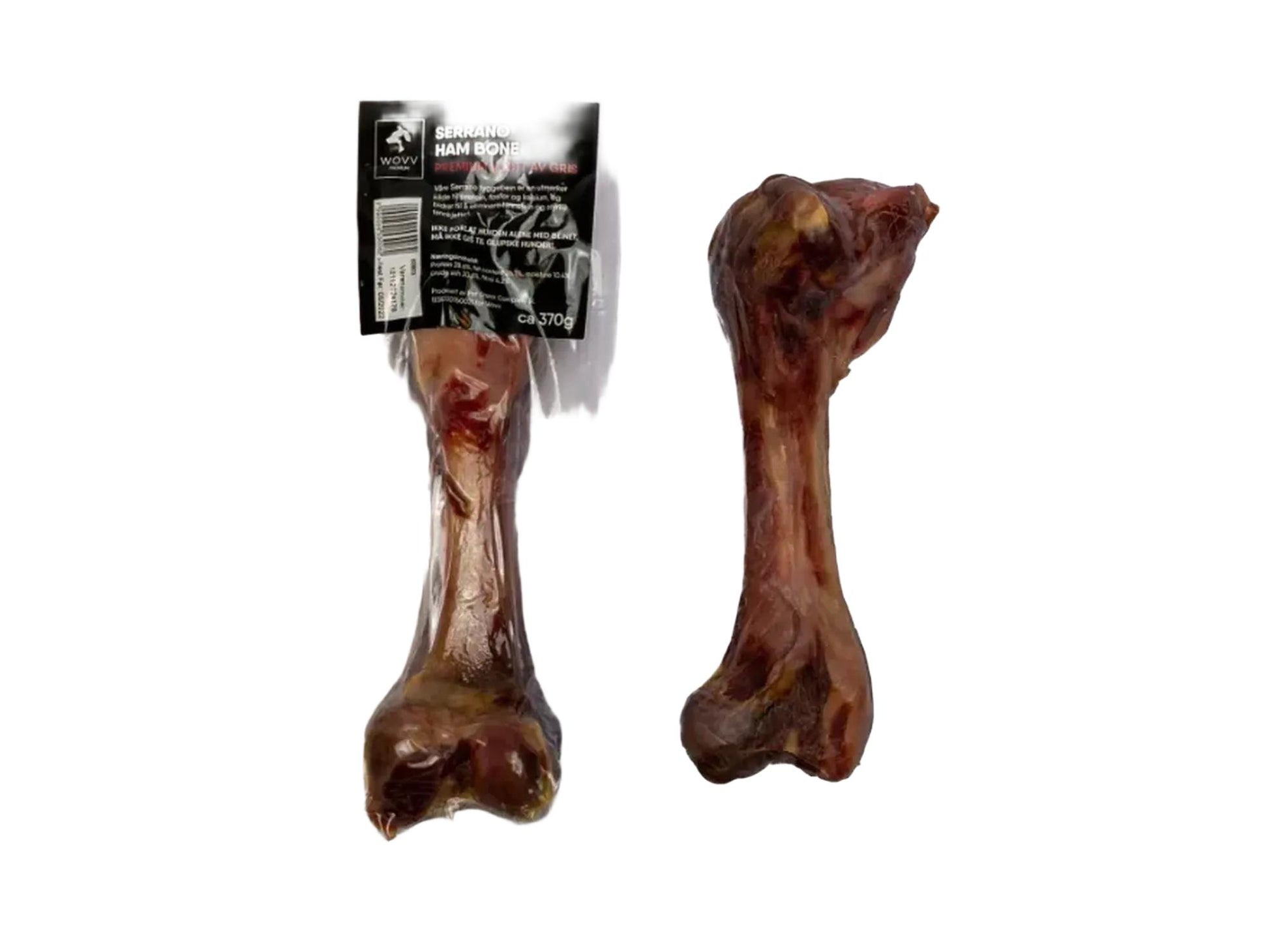 Wovv Serrano Ham Bone, et mørkebrunt halvtørket skinkebein for hund, i og uten emballasje.